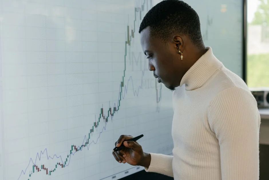 Close-up of a woman working on a digital marketing project in a home office setting.